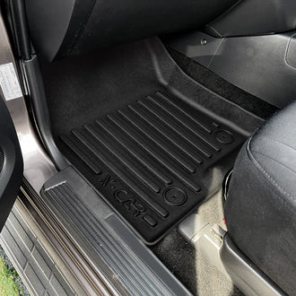 Anti-slip backing keeps mats securely in place for safer driving.