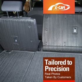X-CAR back seat kick mats installed on the rear seat area.