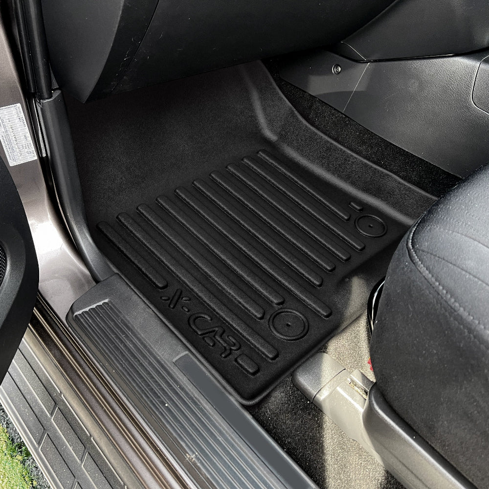 Anti-slip backing keeps mats securely in place for safer driving.