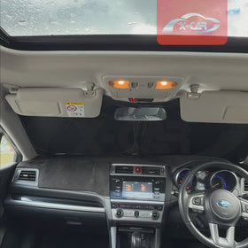 X-CAR WindScreen Sun Shade designed for a Subaru Outback installed on the windscreen of an Outback.